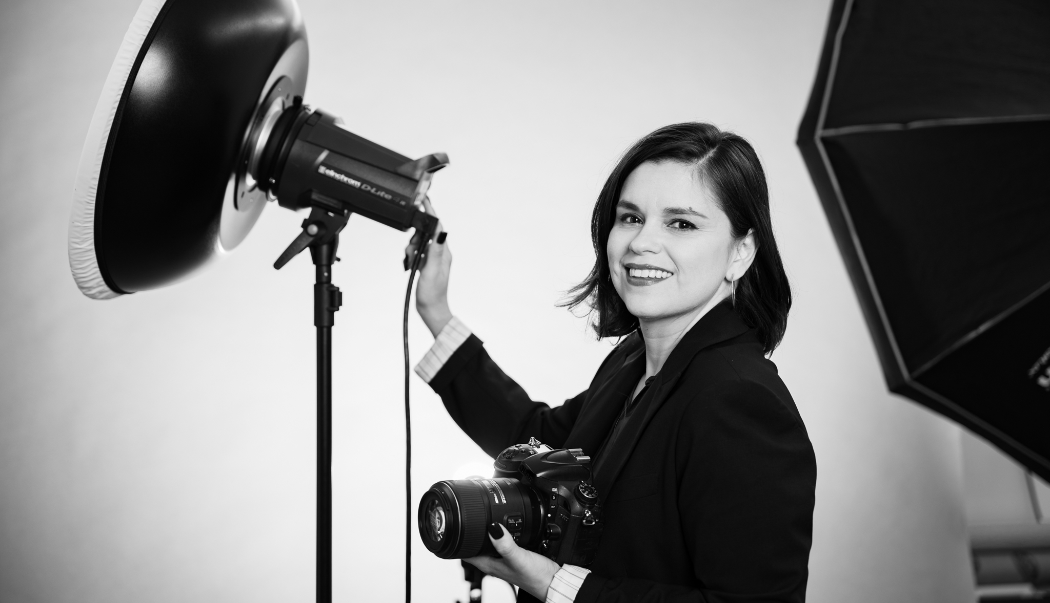 Lucero working in studio with camera and lighting equipment